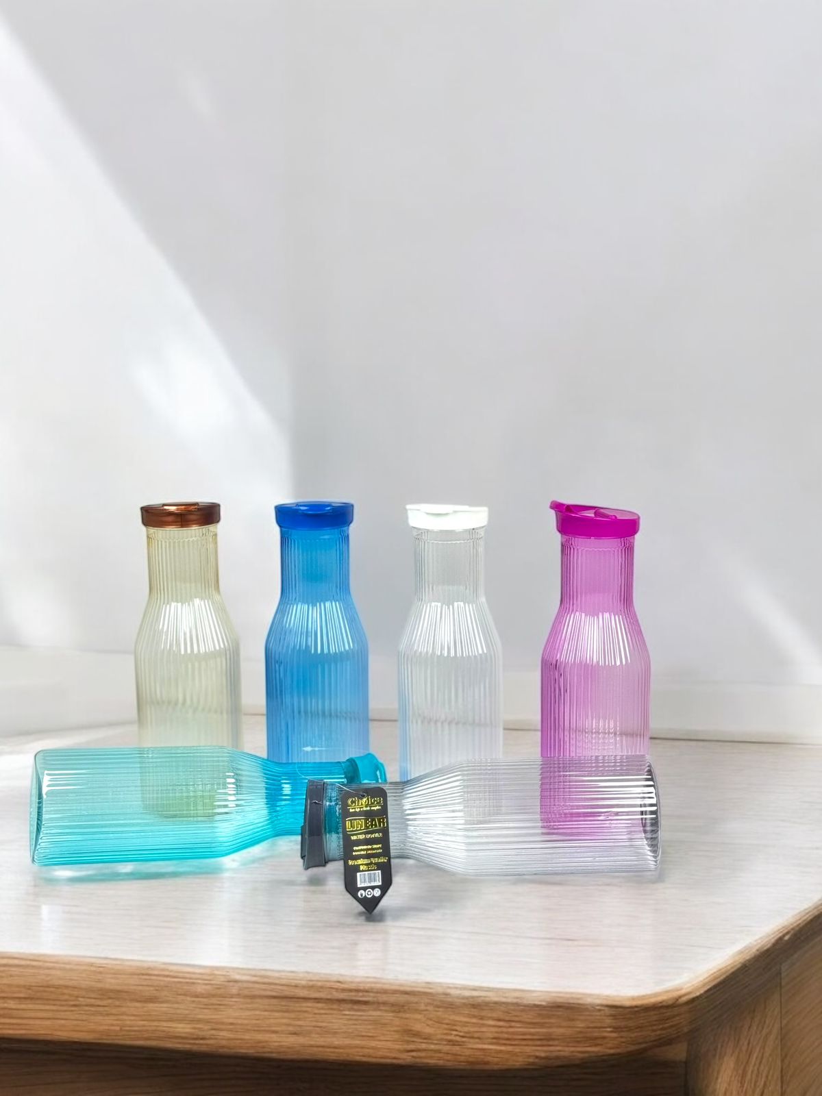 Linear Plastic Juice Bottles, 1700 ml Reusable Empty Juice Bottles with Lids for Milkshake, Plastic Bottles for Water, Juice, Milk